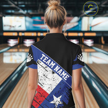 Load image into Gallery viewer, Back view of woman wearing a grunge Texas flag bowling polo shirt inside a bowling alley.