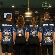 Load image into Gallery viewer, Back view of pool players wearing matching blue lightning eagle billiard shirts in a game room.