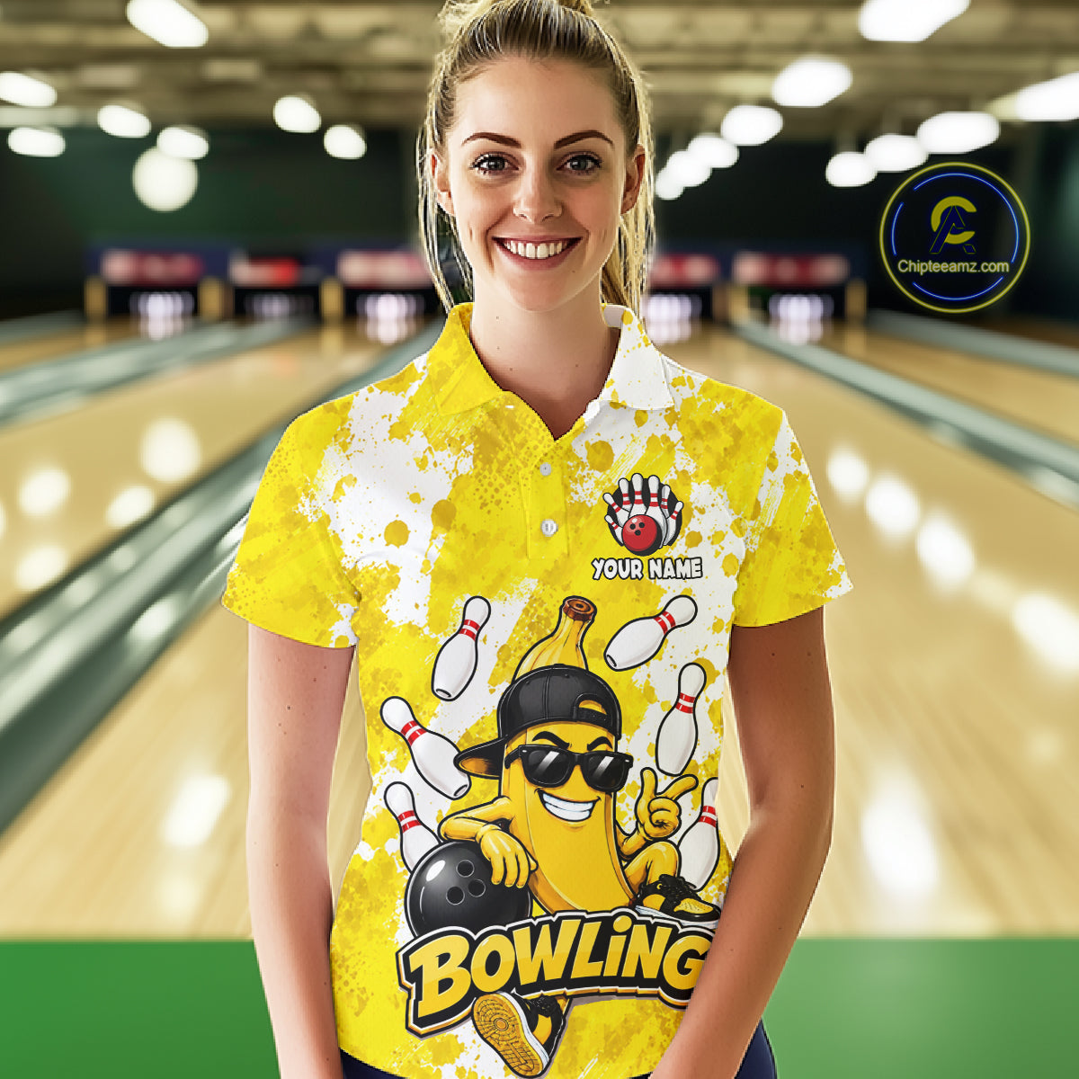 Woman wearing a funny yellow banana bowling polo shirt at a bowling alley front view.