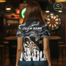 Load image into Gallery viewer, Back view of woman wearing a black marble swirl darts shirt.