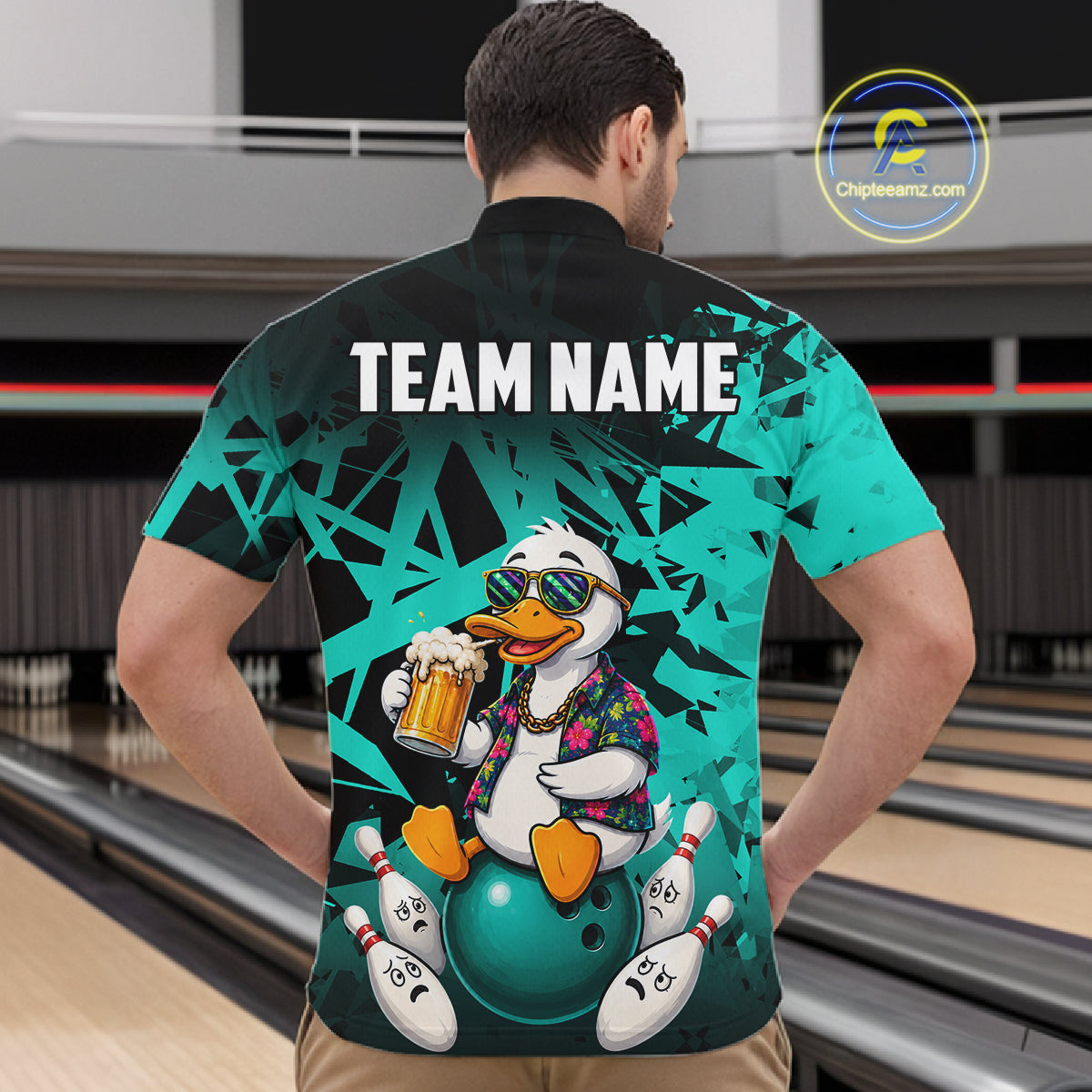 Man wearing personalized turquoise funny duck beer bowling team jersey quarter zip shirt featuring funny duck beer artwork, back view.