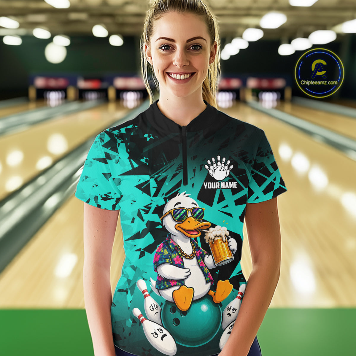 Woman wearing personalized turquoise funny duck beer bowling team jersey quarter zip shirt featuring funny duck beer artwork, front view.