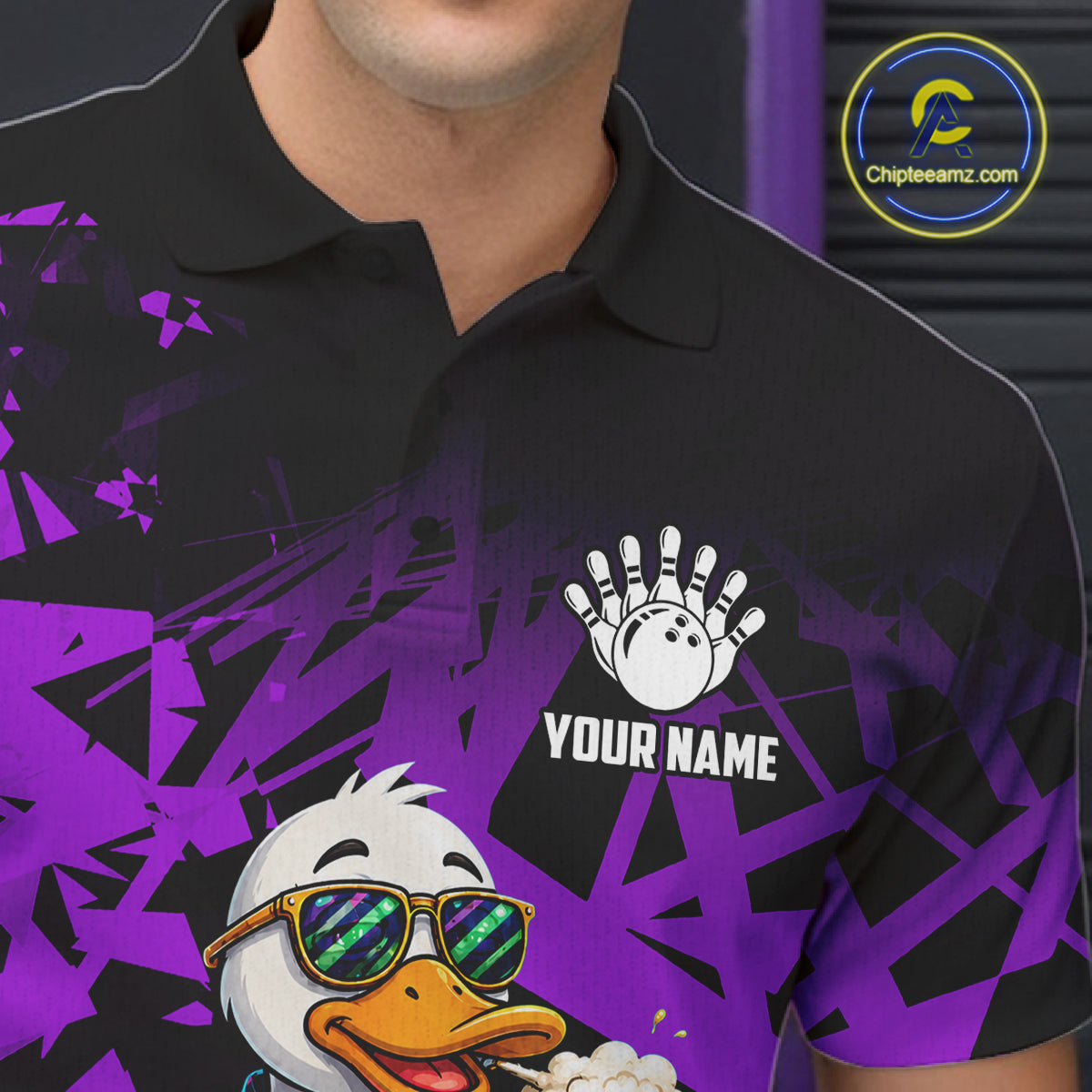 Close-up of personalized purple funny duck beer bowling team jersey polo shirt featuring collar, buttons and funny duck beer artwork.