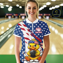 Load image into Gallery viewer, Person wearing a bowling shirt with a duck holding a bowling ball design and American flag, in a bowling alley.