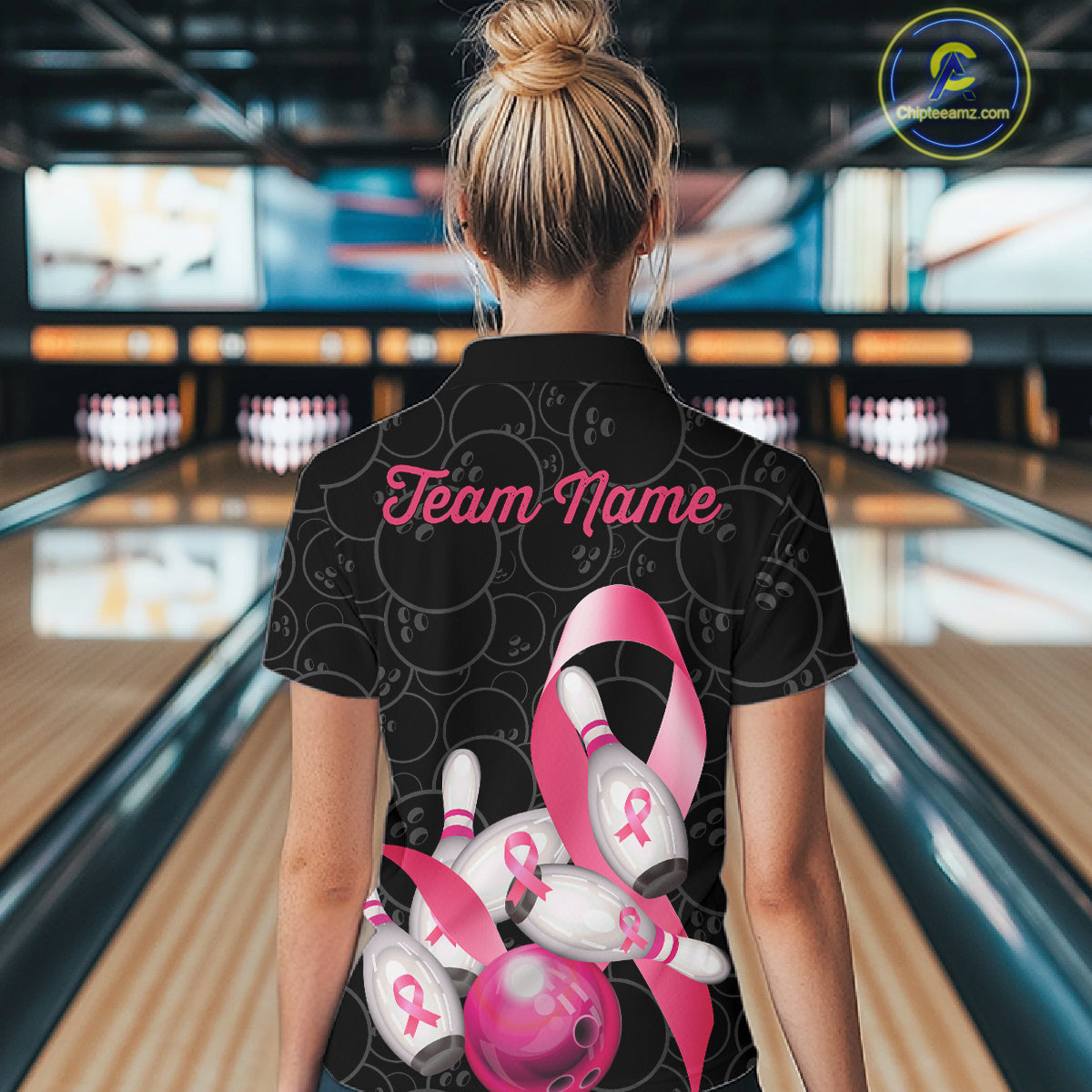 Woman wearing pink ribbon breast cancer awareness bowling team jersey polo shirt featuring pink ribbon artwork, back view.