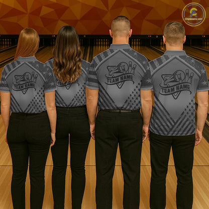 Back view of bowling team wearing matching grey American flag bowling jerseys in a bowling alley.