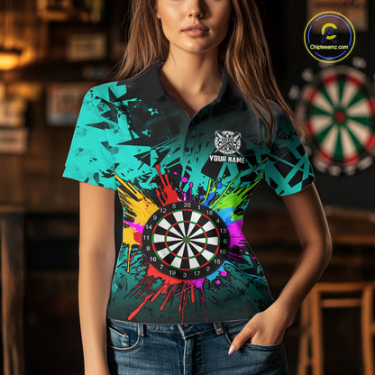 Woman wearing a turquoise dartboard darts shirt during league match front view.