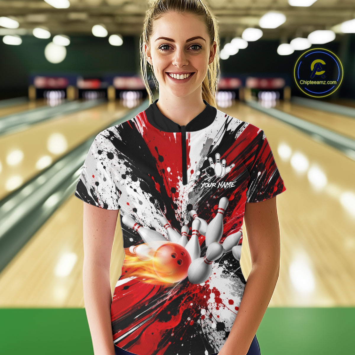 Woman wearing a red splatter bowling quarter zip jersey during bowling league play front view.