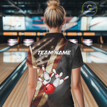 Back view of woman wearing a retro American flag bowling polo shirt inside a bowling alley.