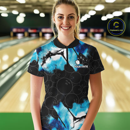Woman wearing a dreamy blue bowling quarter zip jersey during league competition front view.