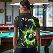 Load image into Gallery viewer, Back view of woman wearing a green thunder lightning 8 ball pool shirt in a billiards hall.