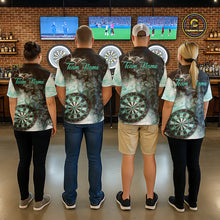 Load image into Gallery viewer, Back view of darts players wearing matching turquoise butterfly smoke darts shirts.