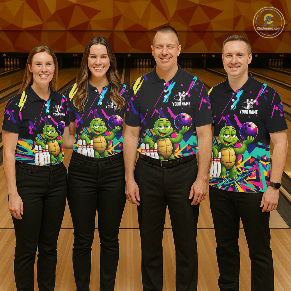 Four people wearing matching bowling-themed shirts with turtle graphic in a bowling alley.
