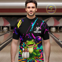 Load image into Gallery viewer, Man wearing a colorful bowling shirt with a frog graphic in a bowling alley.