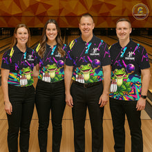 Load image into Gallery viewer, Four people wearing matching bowling-themed shirts with frog graphic in a bowling alley.