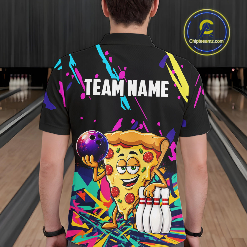 Person wearing a black bowling shirt with colorful design and pizza graphic in a bowling alley.