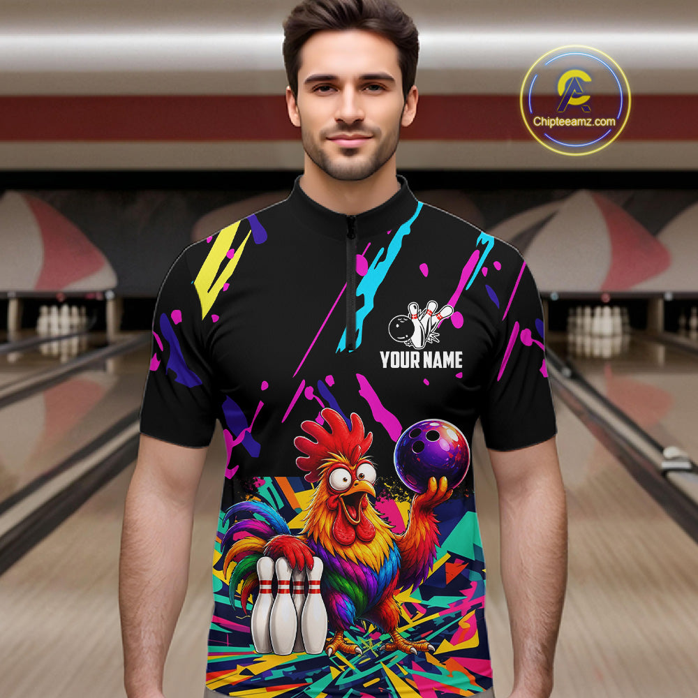 Man wearing a colorful bowling shirt with a chickenn graphic in a bowling alley.