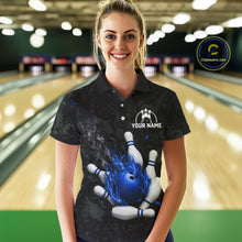 Load image into Gallery viewer, Woman wearing black and blue grunge fire bowling polo shirt front view.