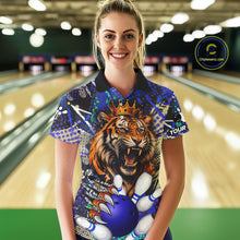 Load image into Gallery viewer, Woman wearing blue graffiti tiger bowling polo shirt front view.