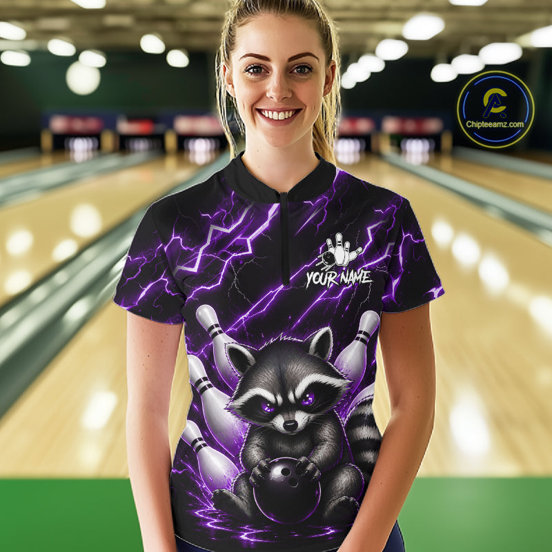 Woman wearing a purple neon lightning raccoon bowling quarter zip jersey during league competition front view.