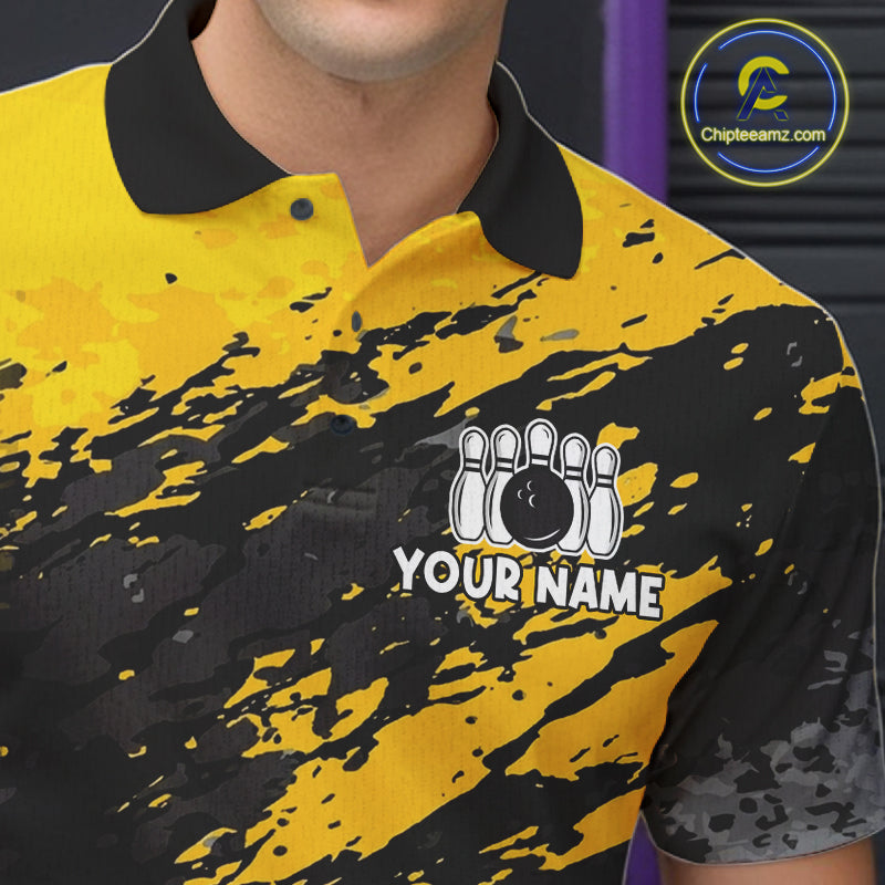 Close-up of a yellow banana grunge bowling polo shirt collar, buttons, and funny artwork.
