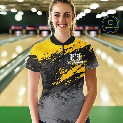 Woman wearing a yellow funny banana bowling quarter zip jersey during league competition front view.
