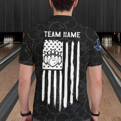 Back view of man wearing a US flag Texas bowling polo shirt inside a bowling alley.
