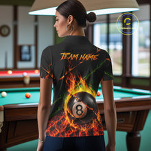 Load image into Gallery viewer, Back view of woman wearing a crack fire flame 8 ball pool shirt in a billiards hall.