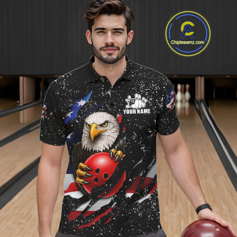 Man wearing a black grunge American flag eagle bowling polo shirt at a bowling alley front view.