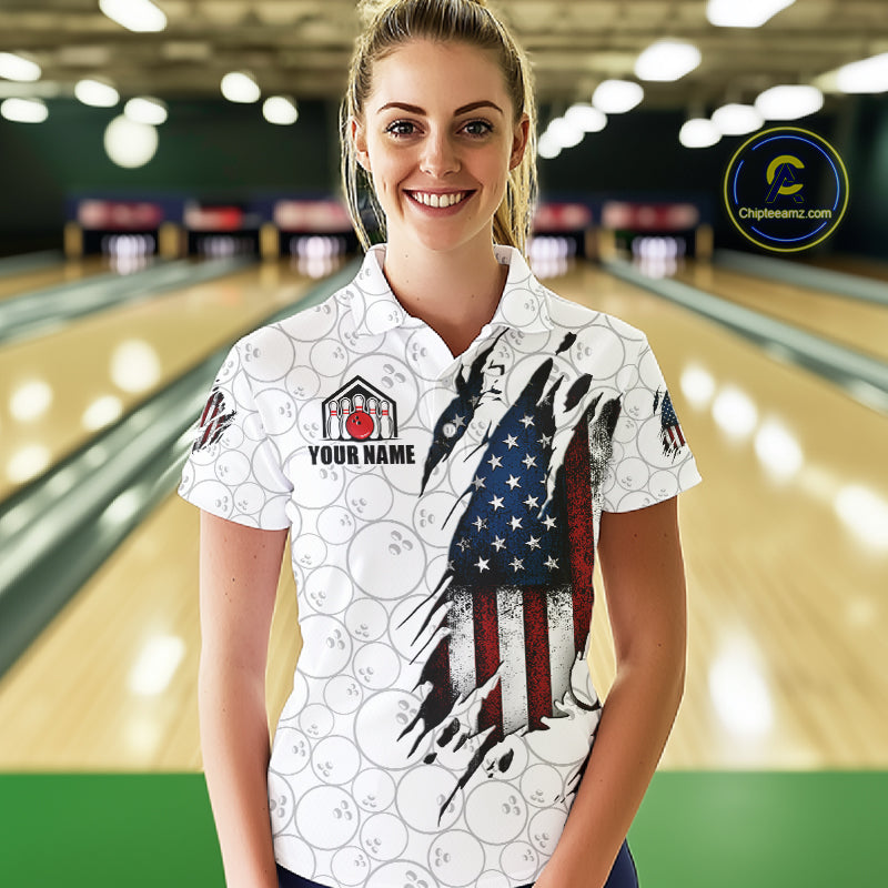 Woman wearing a vintage American flag white bowling polo shirt at a bowling alley front view.