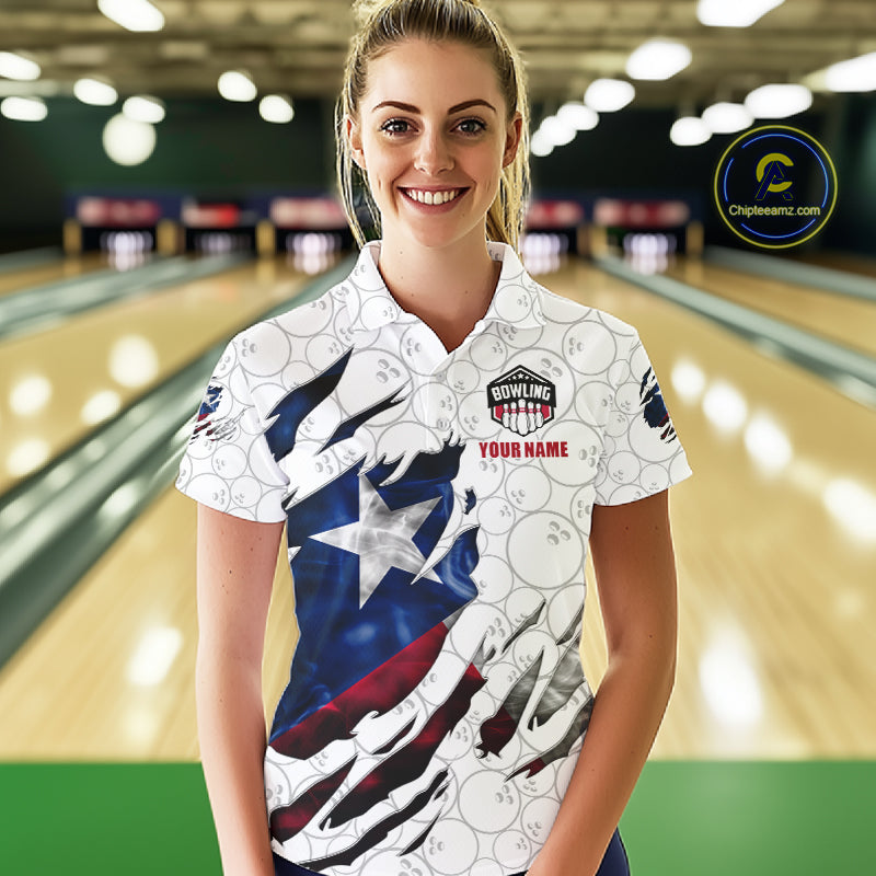 Woman wearing a smoke Texas flag white bowling polo shirt at a bowling alley front view.