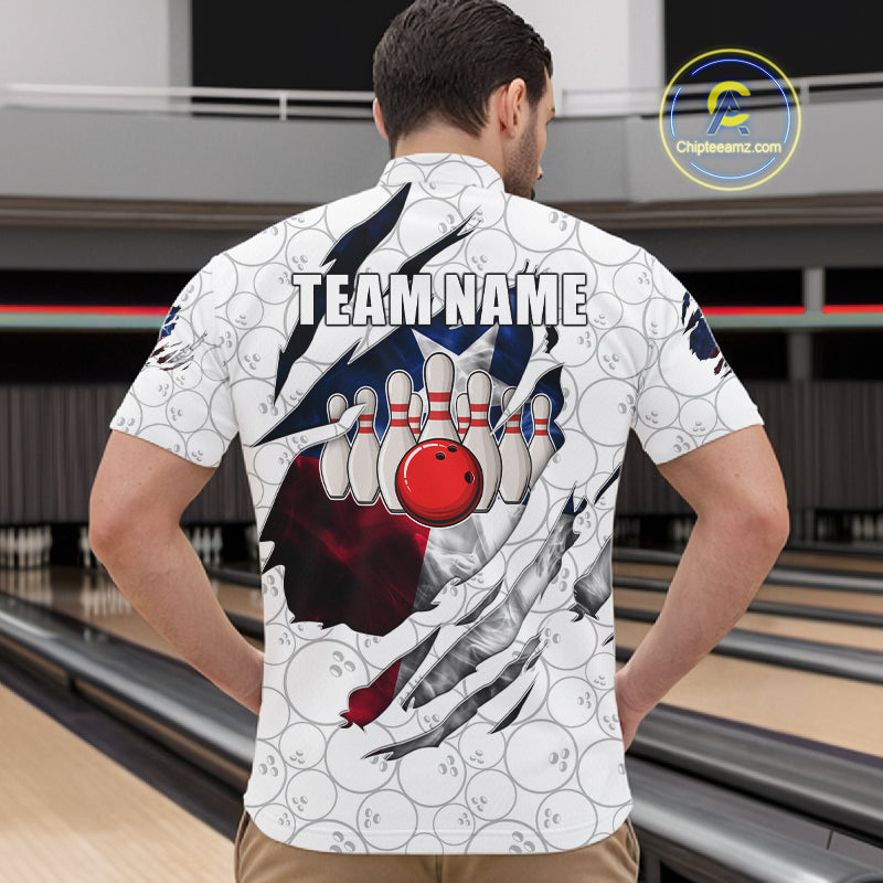 Back view of man wearing a smoke Texas flag white bowling quarter zip shirt in a bowling alley.