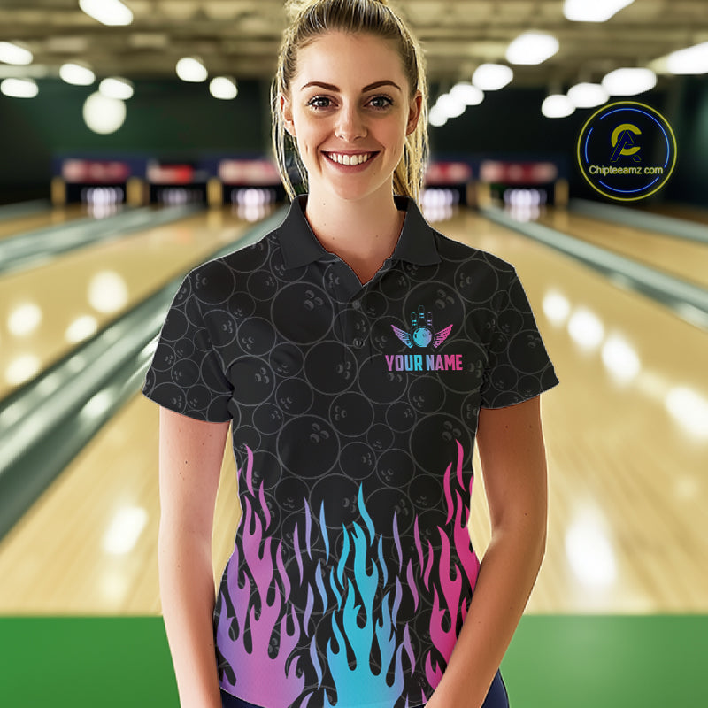 Woman wearing a fire flame neon bowling polo shirt at a bowling alley front view.