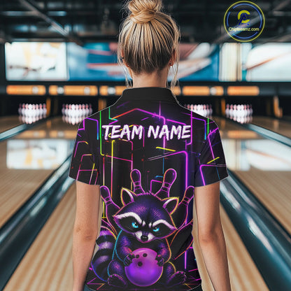 Back view of woman wearing a funny purple neon raccoon bowling polo shirt inside a bowling alley.