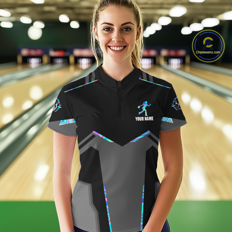 Woman wearing a holographic bowling quarter zip jersey during tournament competition front view.