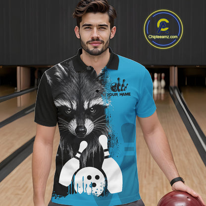 Man wearing a black and blue raccoon bowling polo shirt at a bowling alley front view.