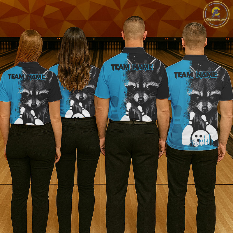 Back view of bowling team wearing matching black and blue raccoon bowling shirts in a bowling alley.