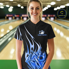 Load image into Gallery viewer, Woman wearing a black and blue bowling ball crown quarter zip bowling shirt front view.