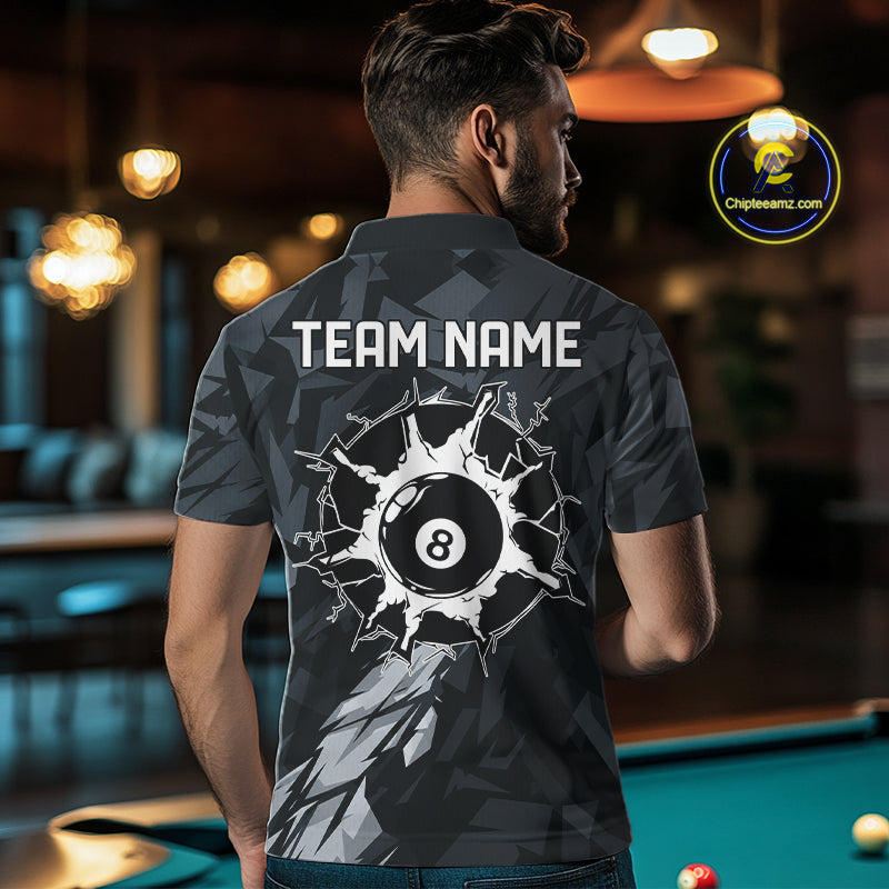 Back view of man wearing a black and grey pool team shirt in a billiards hall.