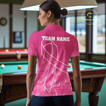 Load image into Gallery viewer, Back view of woman wearing a breast cancer awareness billiard jersey inside a game room.