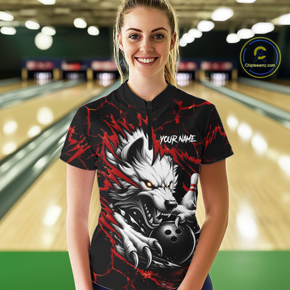Woman wearing black and red custom wolf bowling team jersey quarter zip shirt featuring wolf artwork, front view.