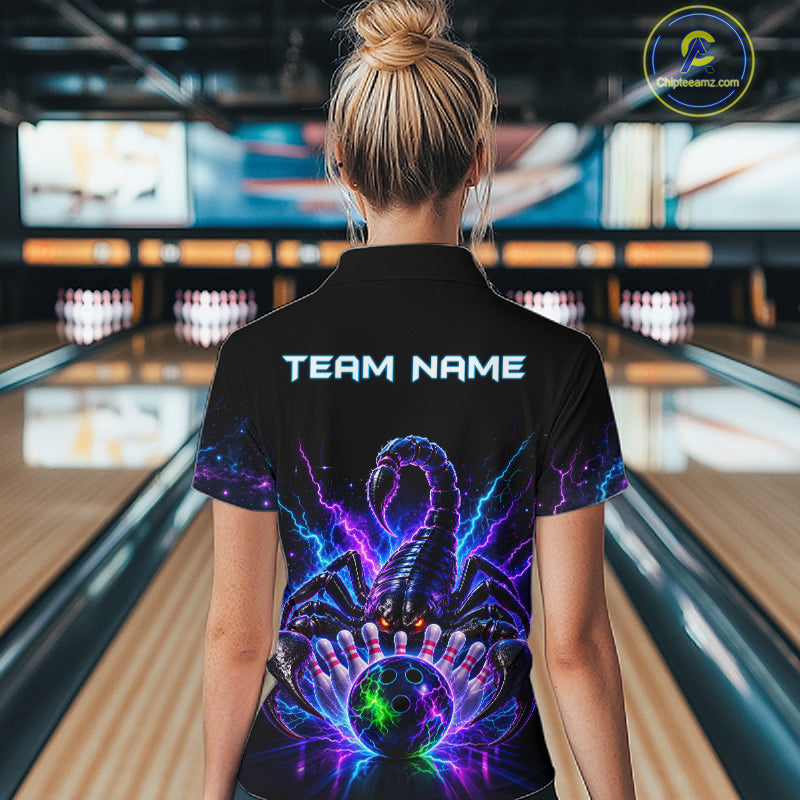 Back view of woman wearing a neon scorpion bowling polo shirt inside a bowling alley.