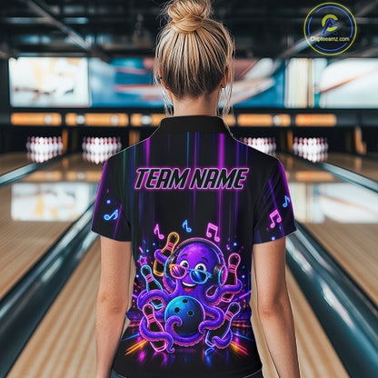 Back view of woman wearing a neon octopus music bowling polo shirt inside a bowling alley.