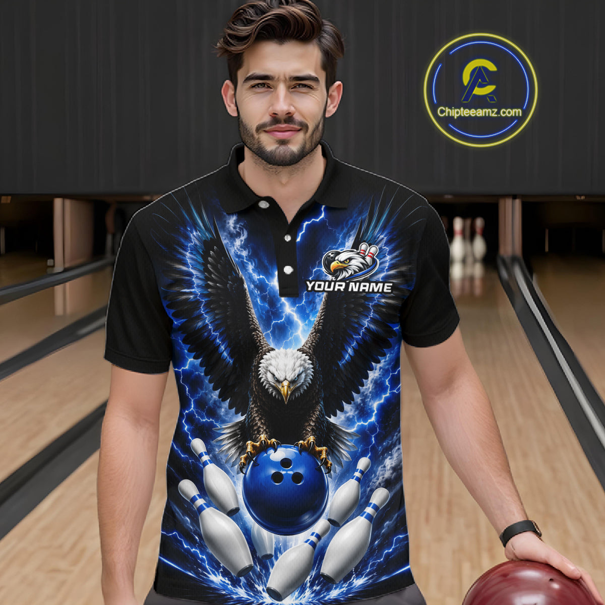 Man wearing a blue thunder lightning eagle bowling polo shirt at a bowling alley front view.