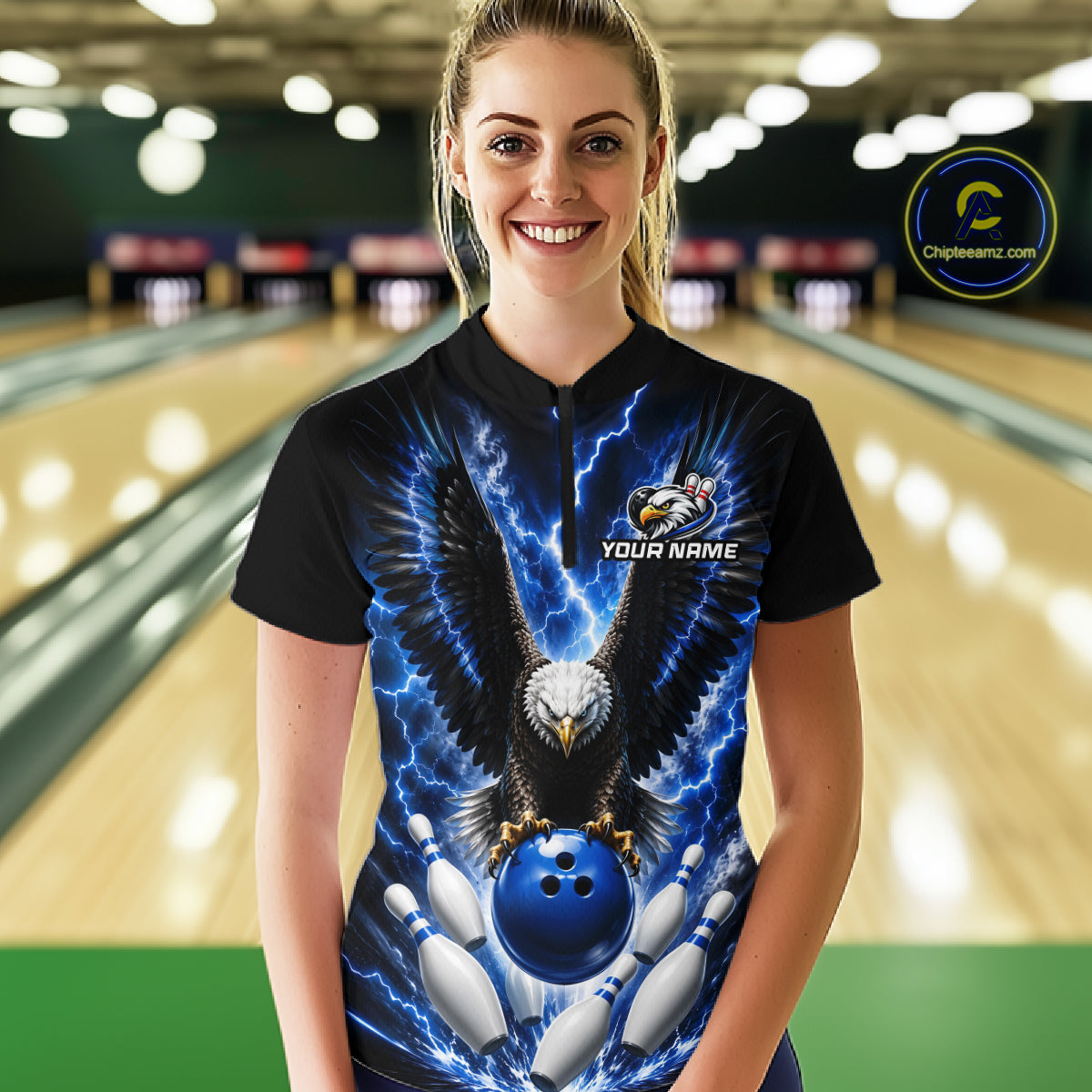 Woman wearing a blue thunder lightning eagle bowling quarter zip jersey during league competition front view.