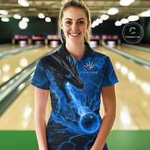 Load image into Gallery viewer, Woman wearing dragon fire flame blue bowling polo shirt front view.