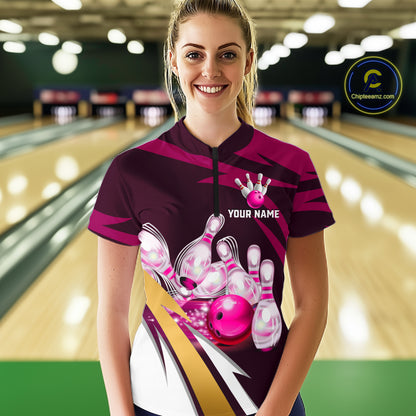 Woman wearing personalized pink strike ball bowling team jersey quarter zip shirt featuring pink strike ball artwork, front view.