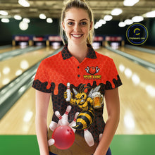 Load image into Gallery viewer, Female model wearing the Black and Red Funny Bee Beer Bowling polo shirt with funny bee, beer mug and red hexagon graphics, front view