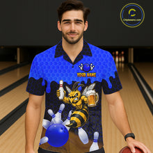 Load image into Gallery viewer, Male model wearing the Black and Blue Funny Bee Beer Bowling Hawaiian shirt featuring a funny bee, beer mug, black and blue hexagon pattern and tropical bowling artwork, front view