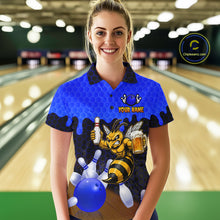 Load image into Gallery viewer, Female model wearing the Black and Blue Funny Bee Beer Bowling polo shirt with funny bee, beer mug and blue hexagon graphics, front view
